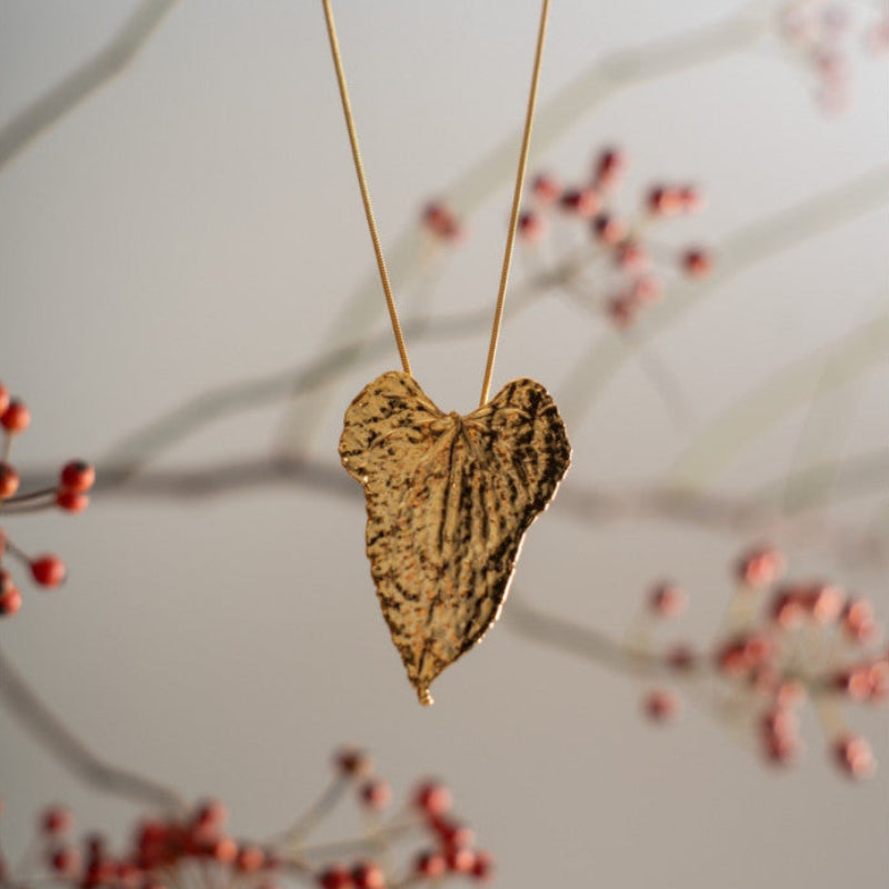 COLLANA CON CIONDOLO DI FOGLIA DI RADICE DI LUCE 85cm
